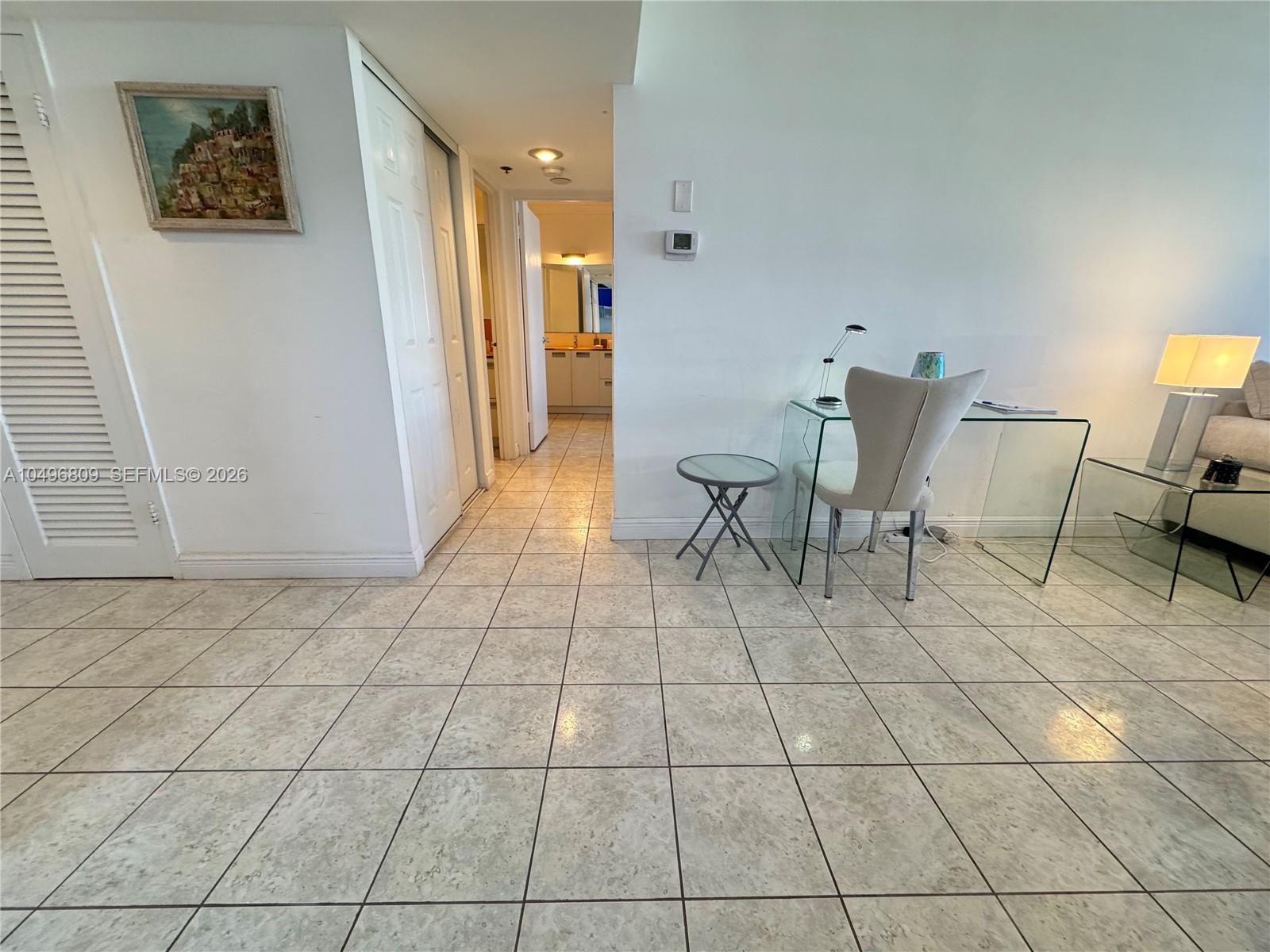 100 Lincoln Road, Unit 1423 Miami Beach, FL 33139 - Photo 13 of 56 a view of a livingroom with furniture and an empty room