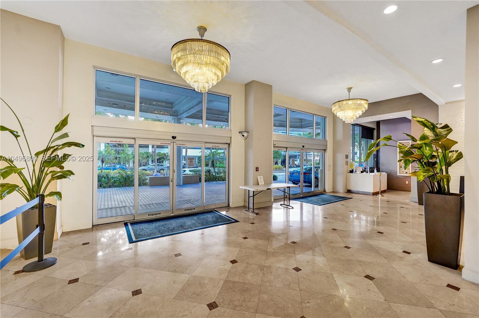 100 Lincoln Road, Unit 1423 Miami Beach, FL 33139 - Photo 32 of 54 a lobby with furniture and floor to ceiling window