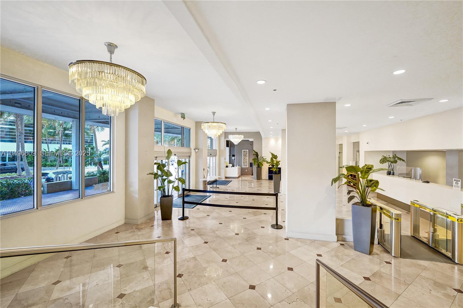 100 Lincoln Road, Unit 1423 Miami Beach, FL 33139 - Photo 36 of 54 a very nice looking room with a large window and chandelier