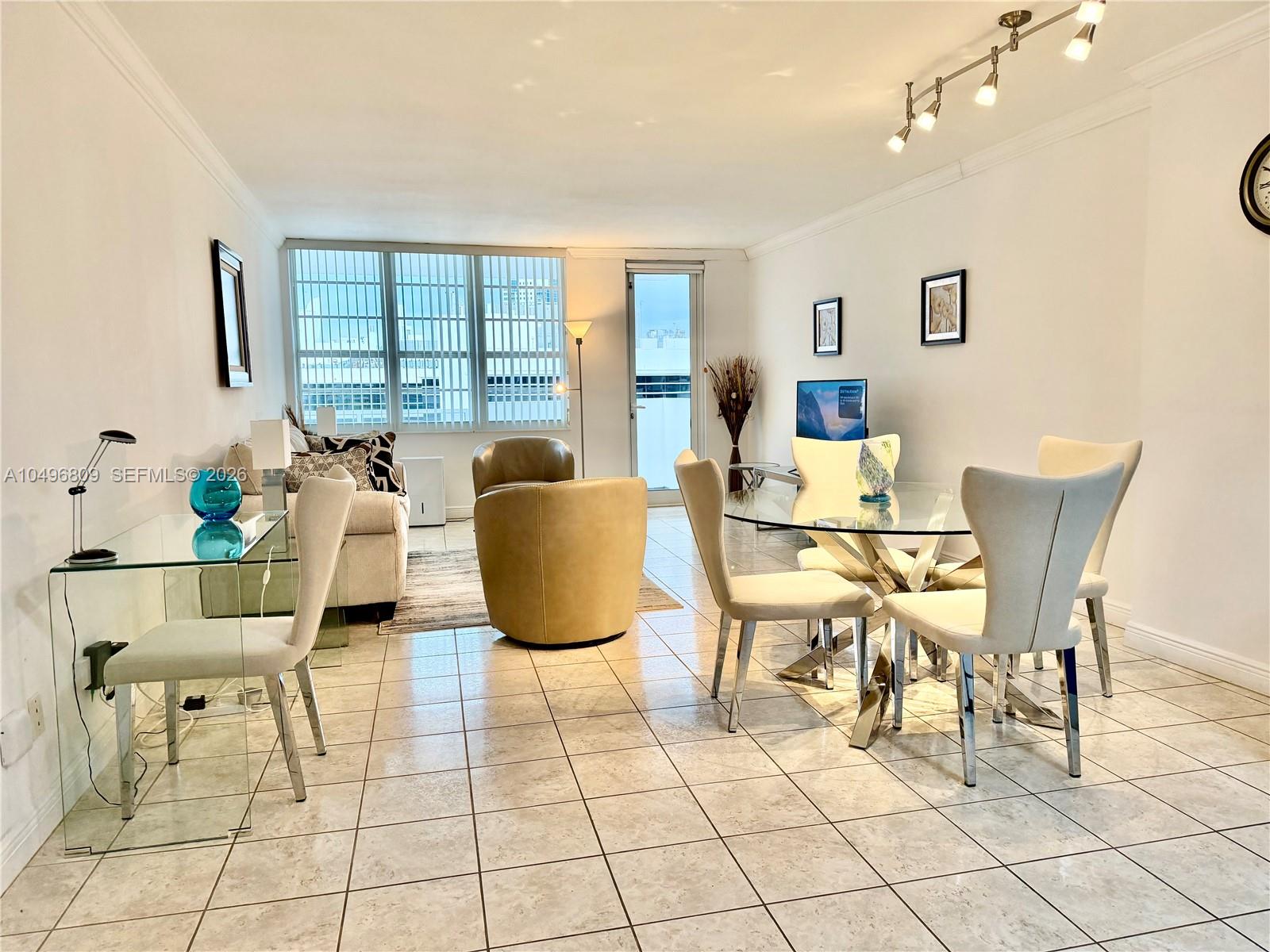 100 Lincoln Road, Unit 1423 Miami Beach, FL 33139 - Photo 4 of 8 a view of a dining room with furniture