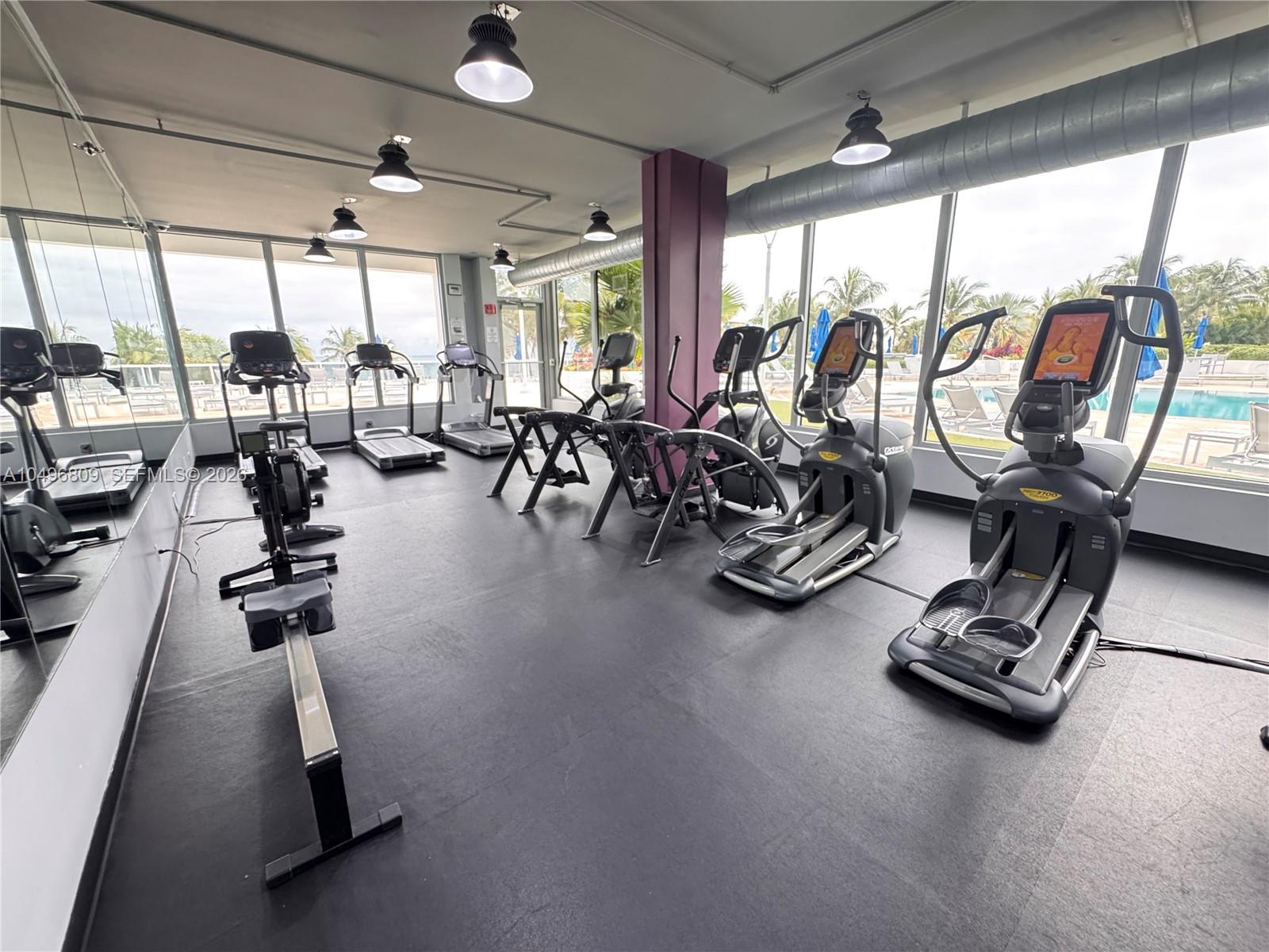 100 Lincoln Road, Unit 1423 Miami Beach, FL 33139 - Photo 45 of 56 a view of a room with gym equipment
