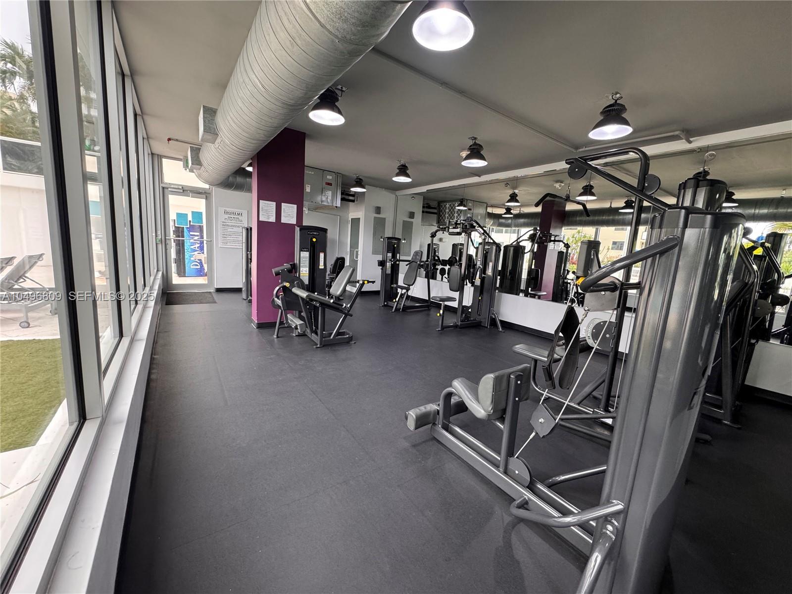 100 Lincoln Road, Unit 1423 Miami Beach, FL 33139 - Photo 45 of 54 a view of a room with gym equipment
