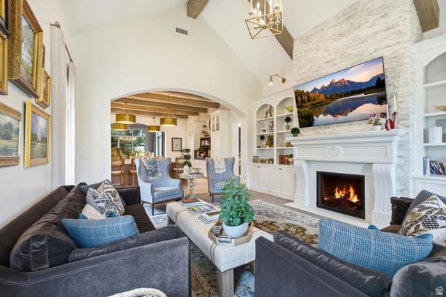 71 Farm Road Midway, UT 84049 - Photo 48 of 92 Spacious living area featuring a prominent fireplace with a substantial mantel, flanked by built-in white cabinetry