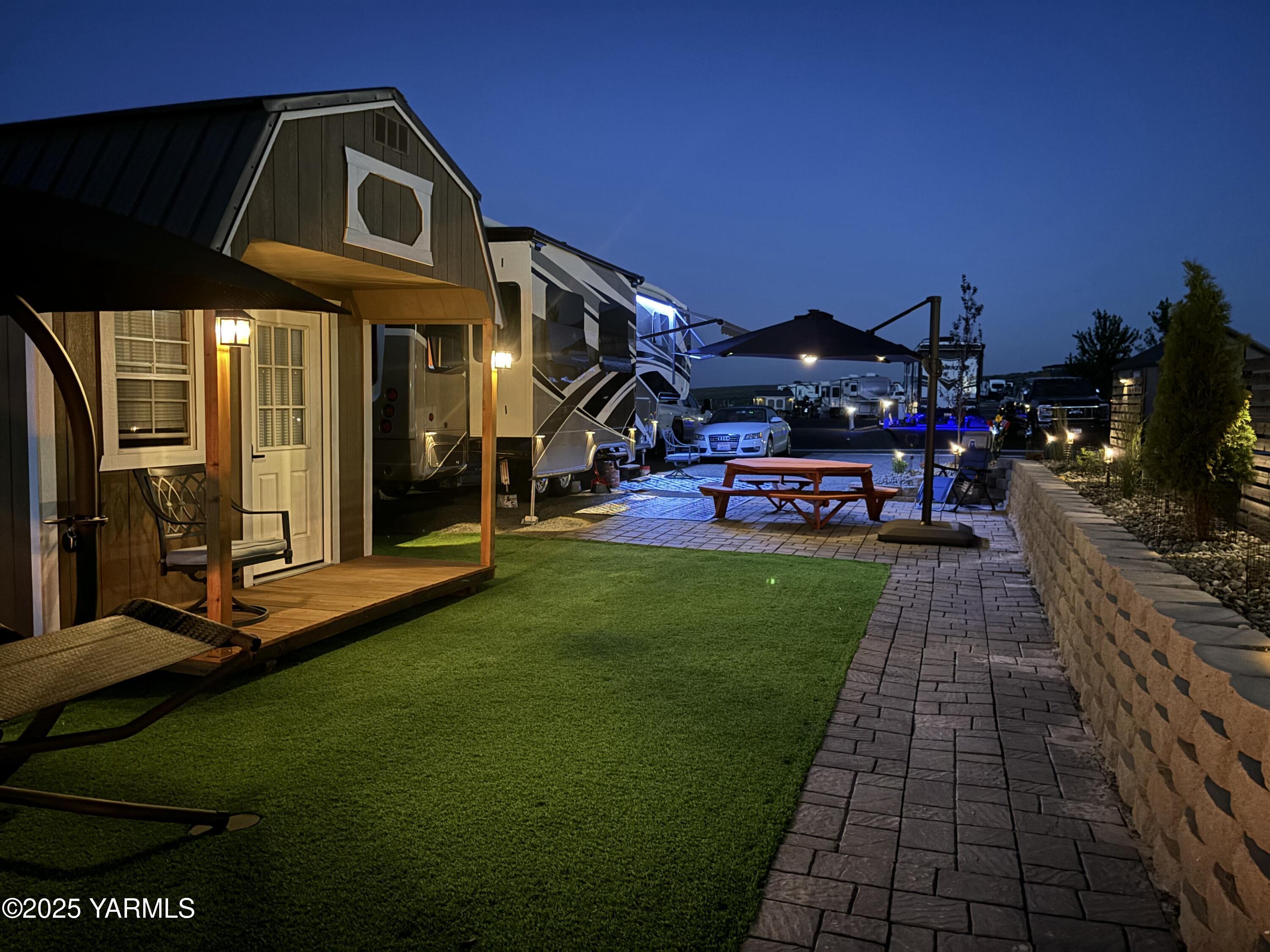 1769 Naches Wenas Road, Unit 6 Selah, WA 98942 - Photo 11 of 13 a view of a chairs and table in the patio