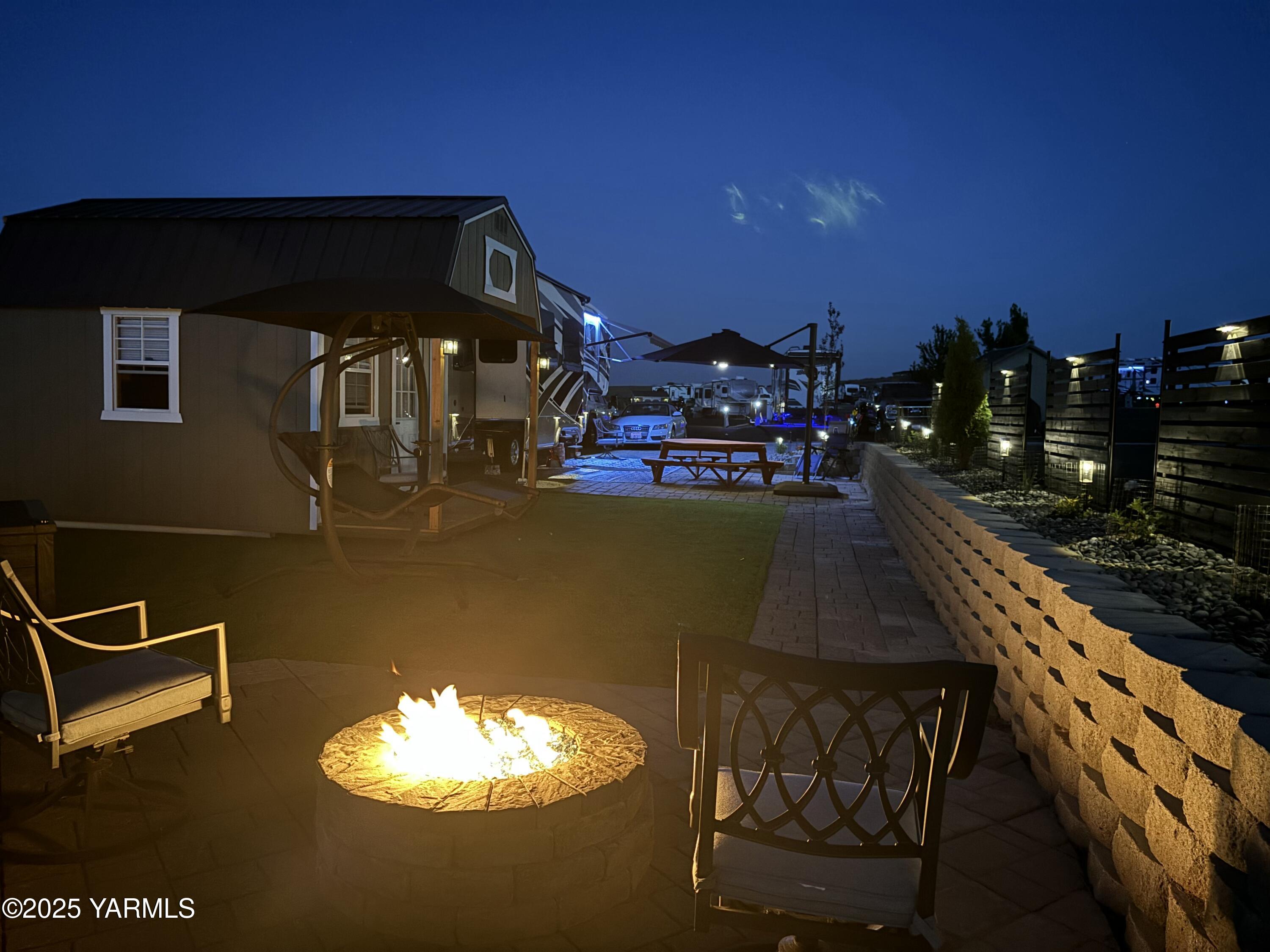 1769 Naches Wenas Road, Unit 6 Selah, WA 98942 - Photo 12 of 13 a view of a balcony with two chairs