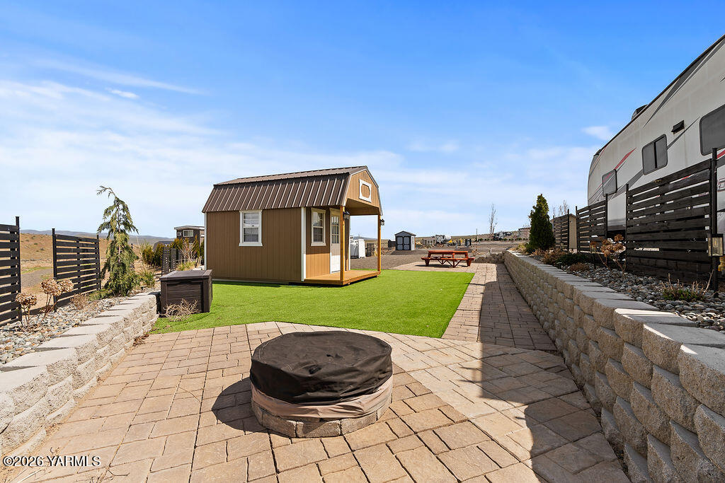 1769 Naches Wenas Road, Unit 6 Selah, WA 98942 - Photo 2 of 11 a view of a house with a yard