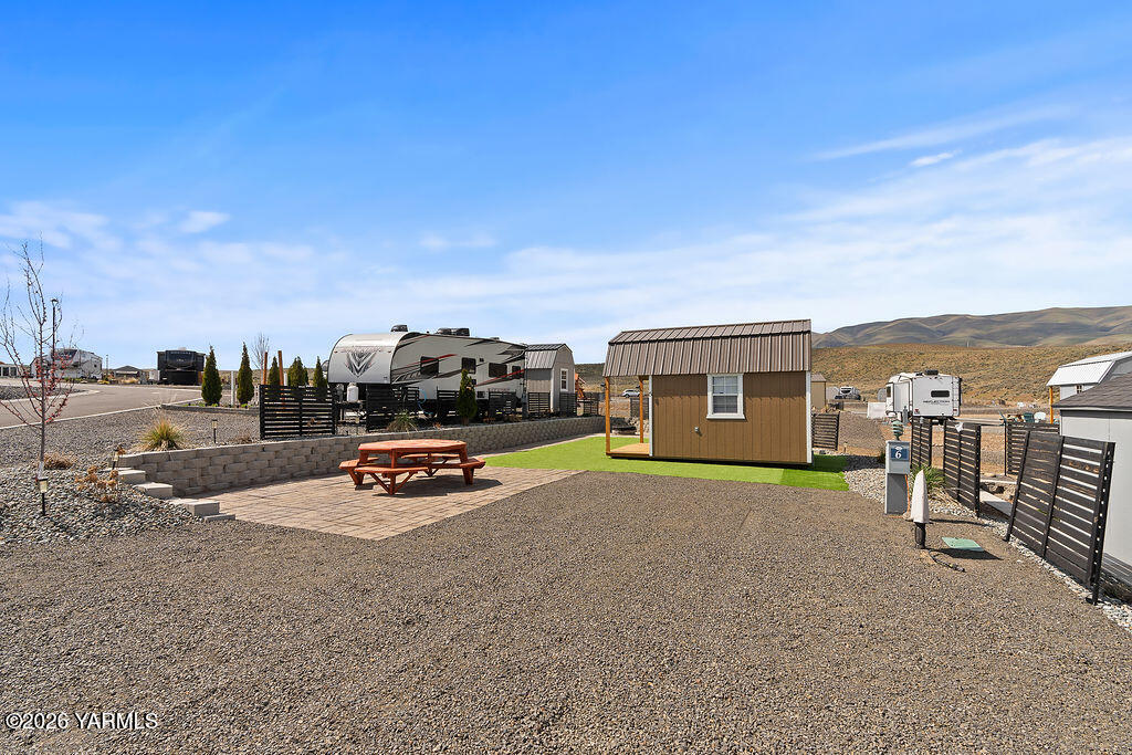 1769 Naches Wenas Road, Unit 6 Selah, WA 98942 - Photo 3 of 11 a view of a house with outdoor space and sitting area