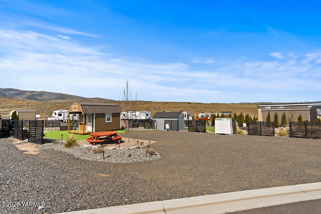 1769 Naches Wenas Road, Unit 6 Selah, WA 98942 - Photo 4 of 11 a view of a building with ocean view