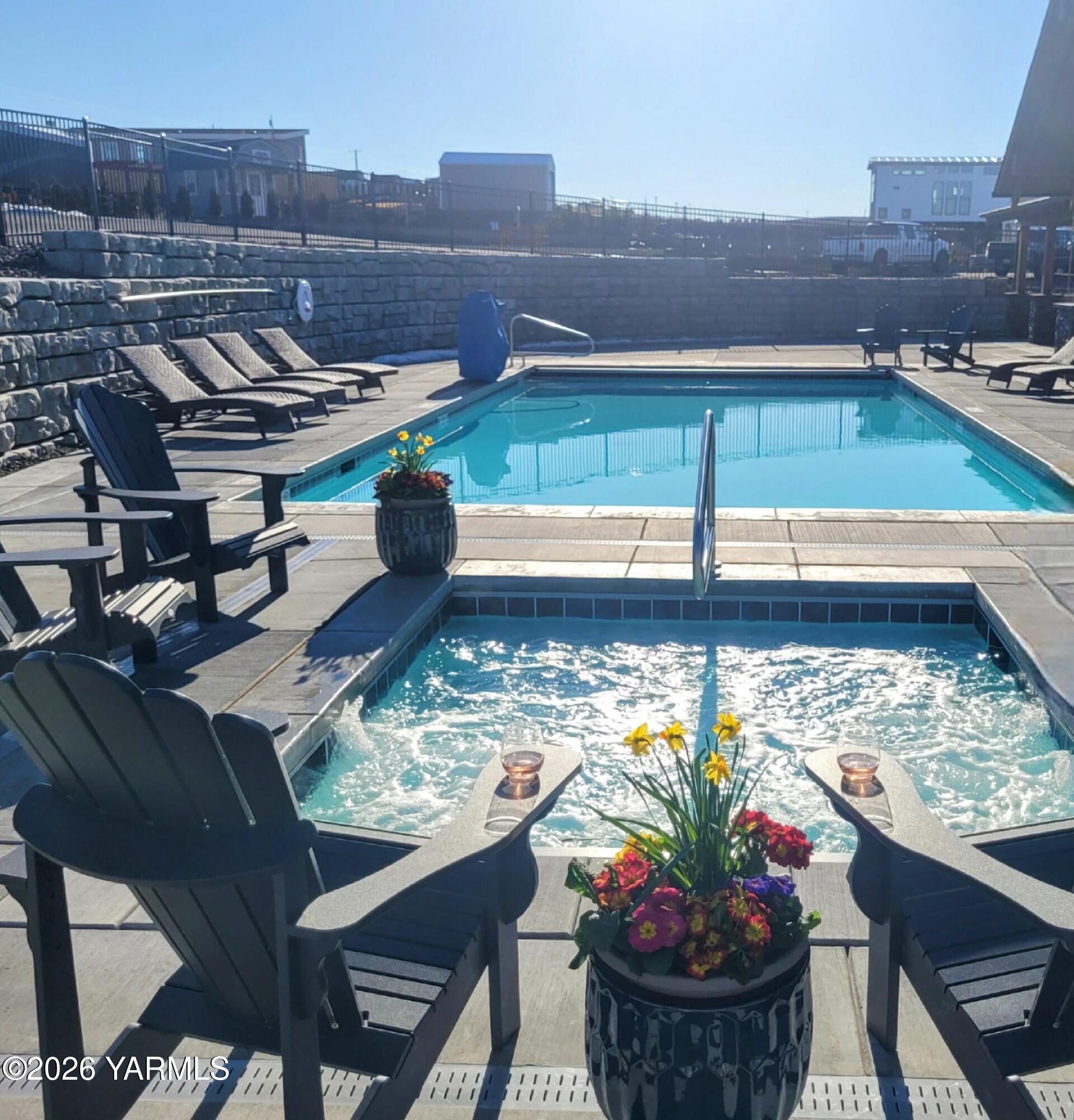 1769 Naches Wenas Road, Unit 6 Selah, WA 98942 - Photo 7 of 11 a view of a balcony with dining table and chairs