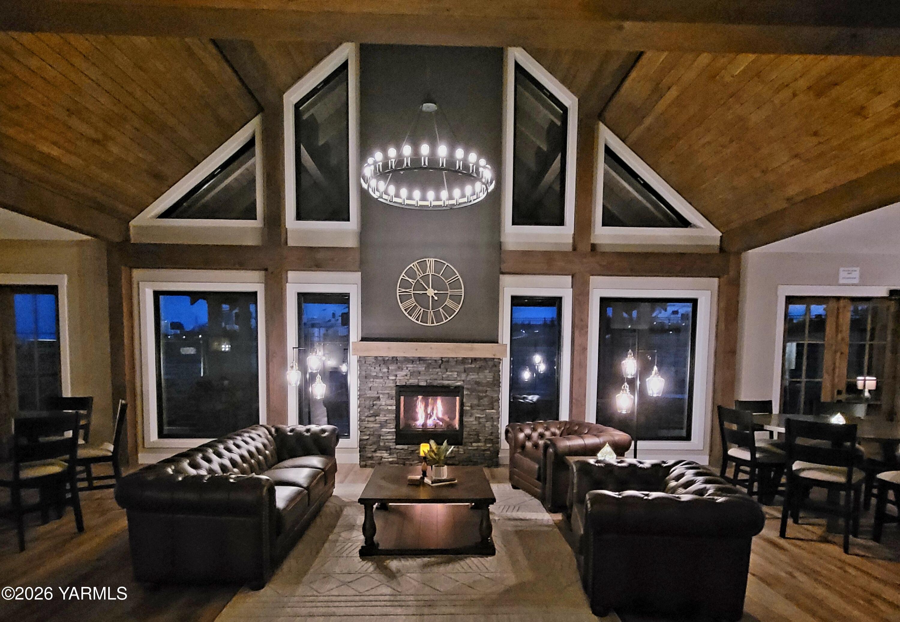 1769 Naches Wenas Road, Unit 6 Selah, WA 98942 - Photo 8 of 11 a living room with furniture fireplace and a flat screen tv