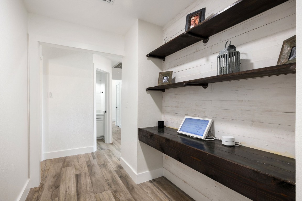 213 Beauchamp Road Dripping Springs, TX 78620 - Photo 22 of 40 a view of workspace with wooden floor