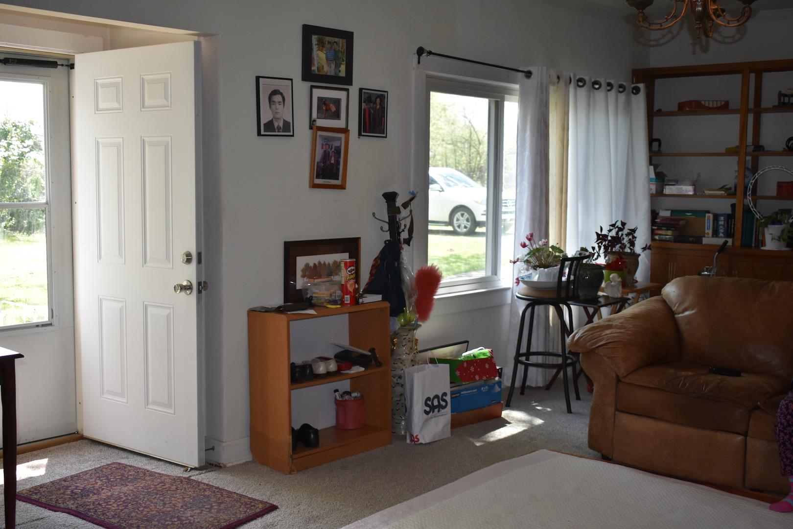8828 Cedar Grove Road Portland, TN 37148 - Photo 3 of 29 a living room with furniture a window and a flat screen tv