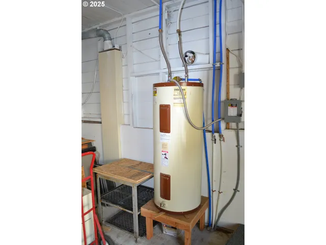 a balcony with table and chairs