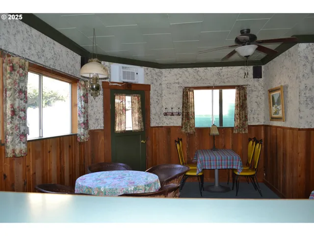 a bedroom with furniture and a window