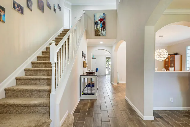 a view of living room and kitchen with furniture