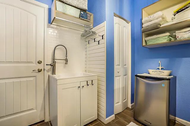 a spacious bathroom with a tub sink a mirror a shower and vanity