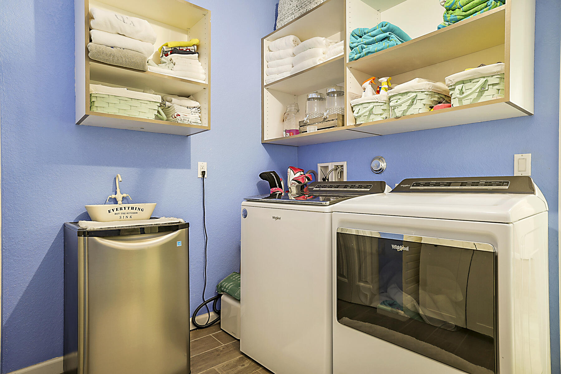 7131 Limestone Cay Road Limestone Creek, FL 33458 - Photo 23 of 65 a utility room with dryer washer and a view of living room