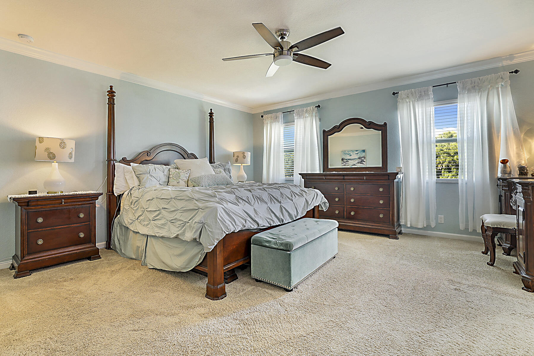 7131 Limestone Cay Road Limestone Creek, FL 33458 - Photo 26 of 65 a bedroom with a bed and a dresser in it