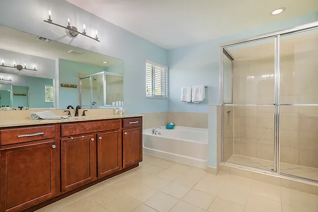a view of a livingroom with furniture and staircase