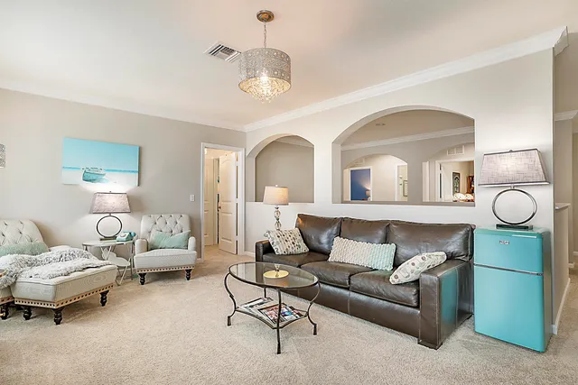 a view of an chairs and table in the backyard