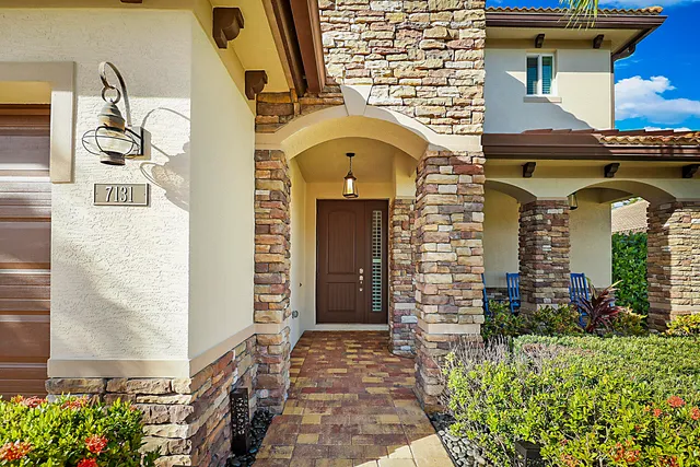 a bedroom with furniture and a wooden floor
