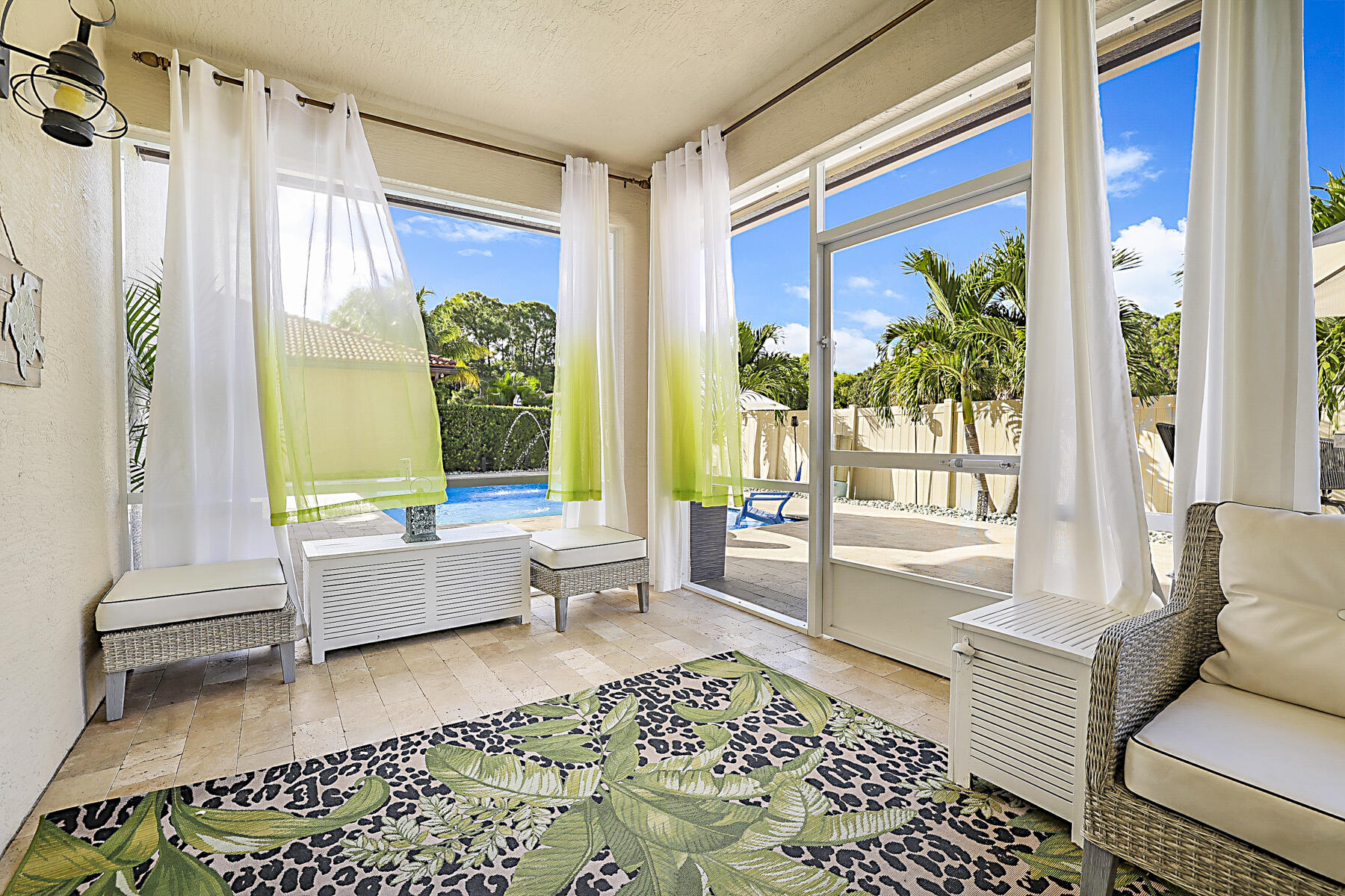 7131 Limestone Cay Road Limestone Creek, FL 33458 - Photo 45 of 65 a living room with a couch and a table
