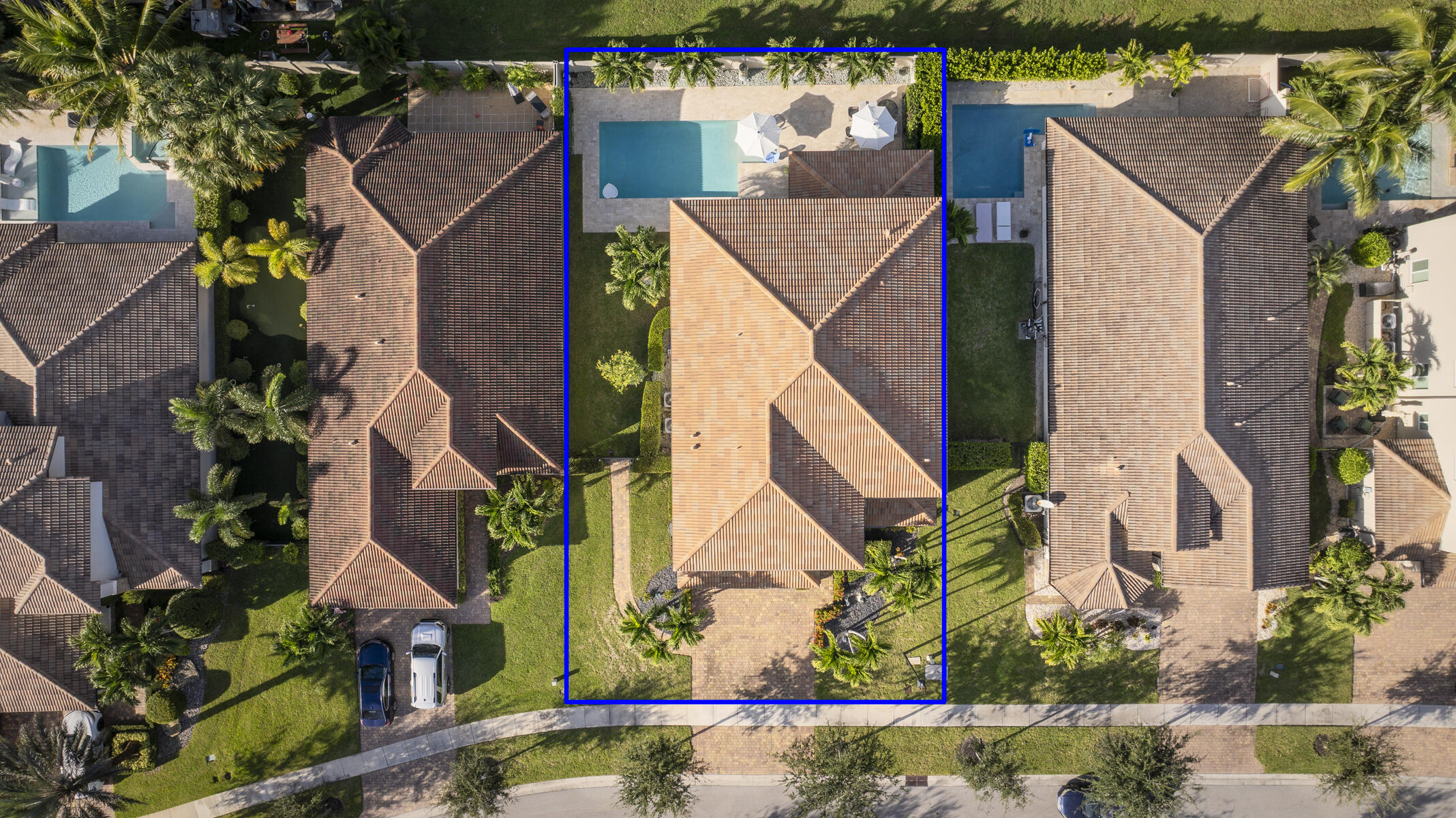 7131 Limestone Cay Road Limestone Creek, FL 33458 - Photo 65 of 65 an aerial view of a house with a yard and potted plants