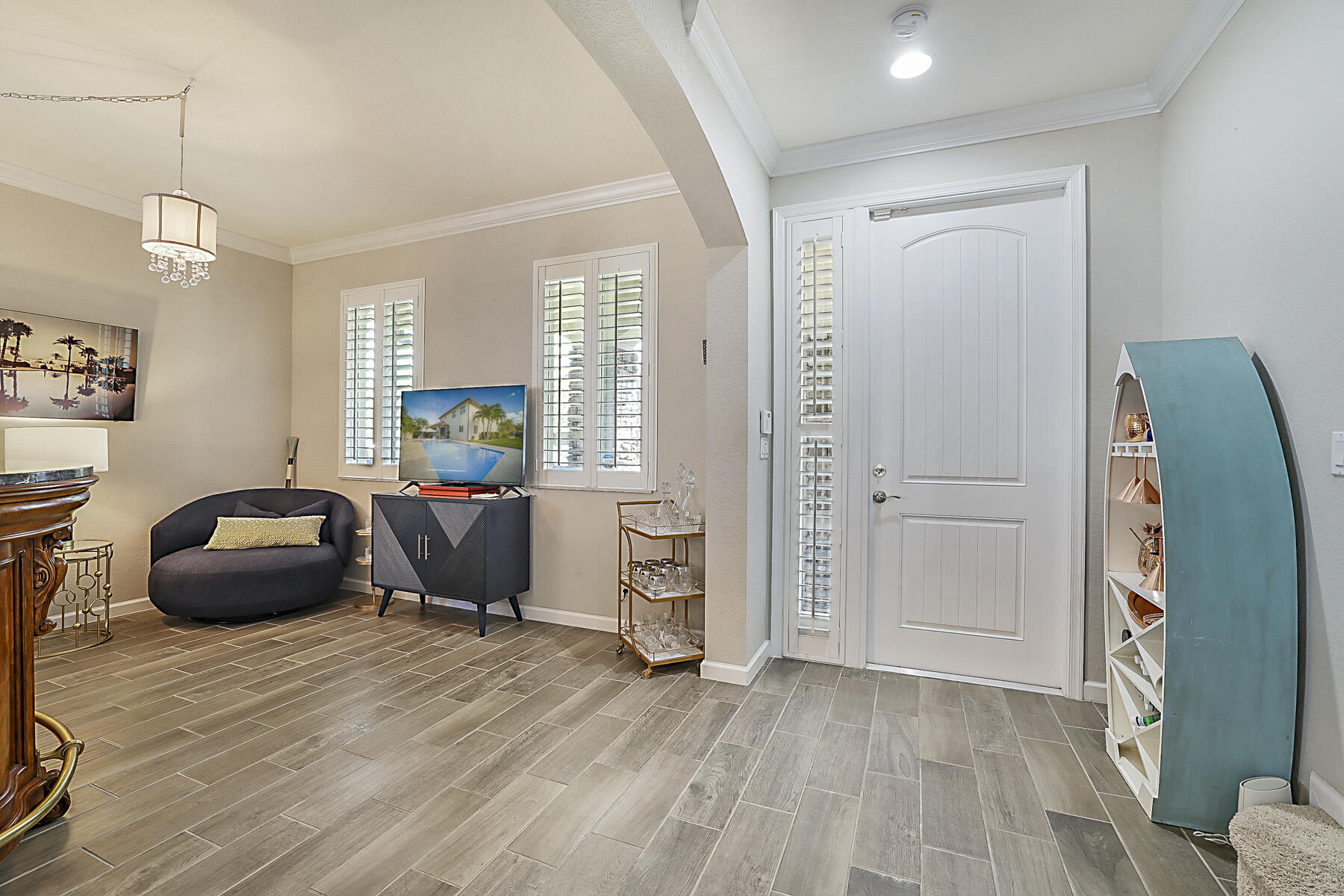 7131 Limestone Cay Road Limestone Creek, FL 33458 - Photo 7 of 65 a bedroom with furniture and a wooden floor