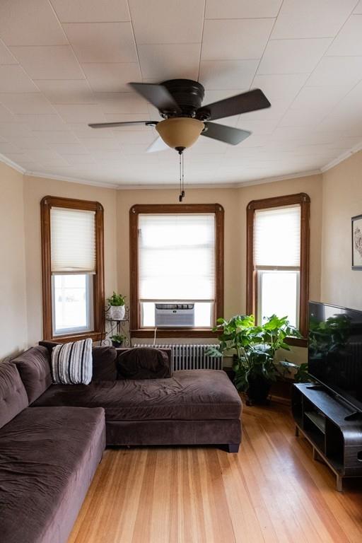 97 Stevens Street Fall River, MA 02721 - Photo 13 of 20 a spacious bedroom with a bed and a couch