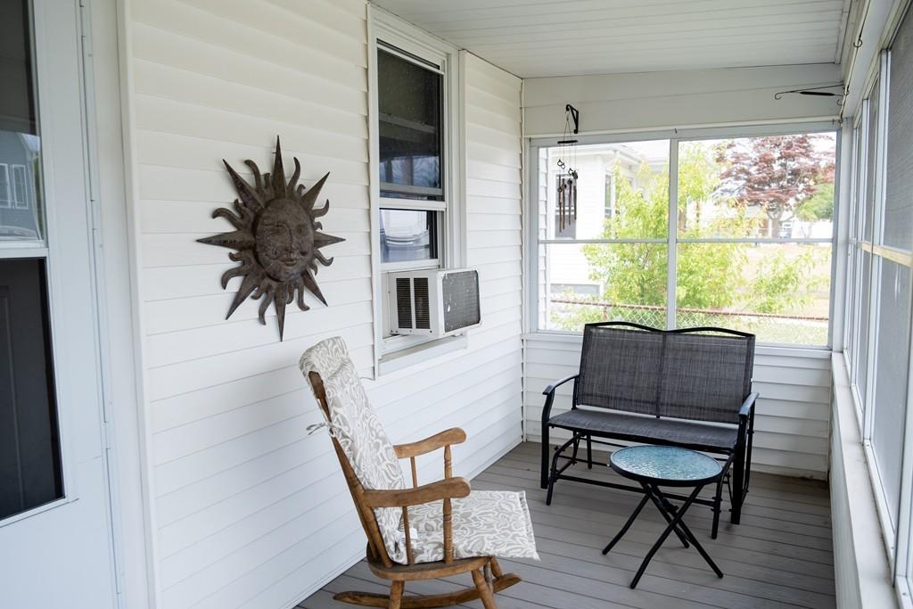 97 Stevens Street Fall River, MA 02721 - Photo 9 of 20 a living room with furniture and a window