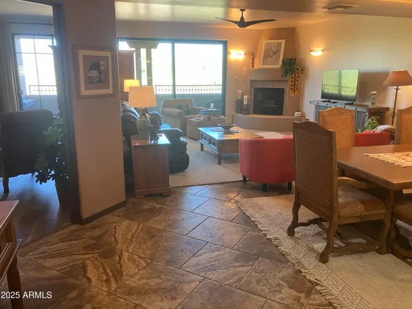 a workspace with furniture and a fireplace