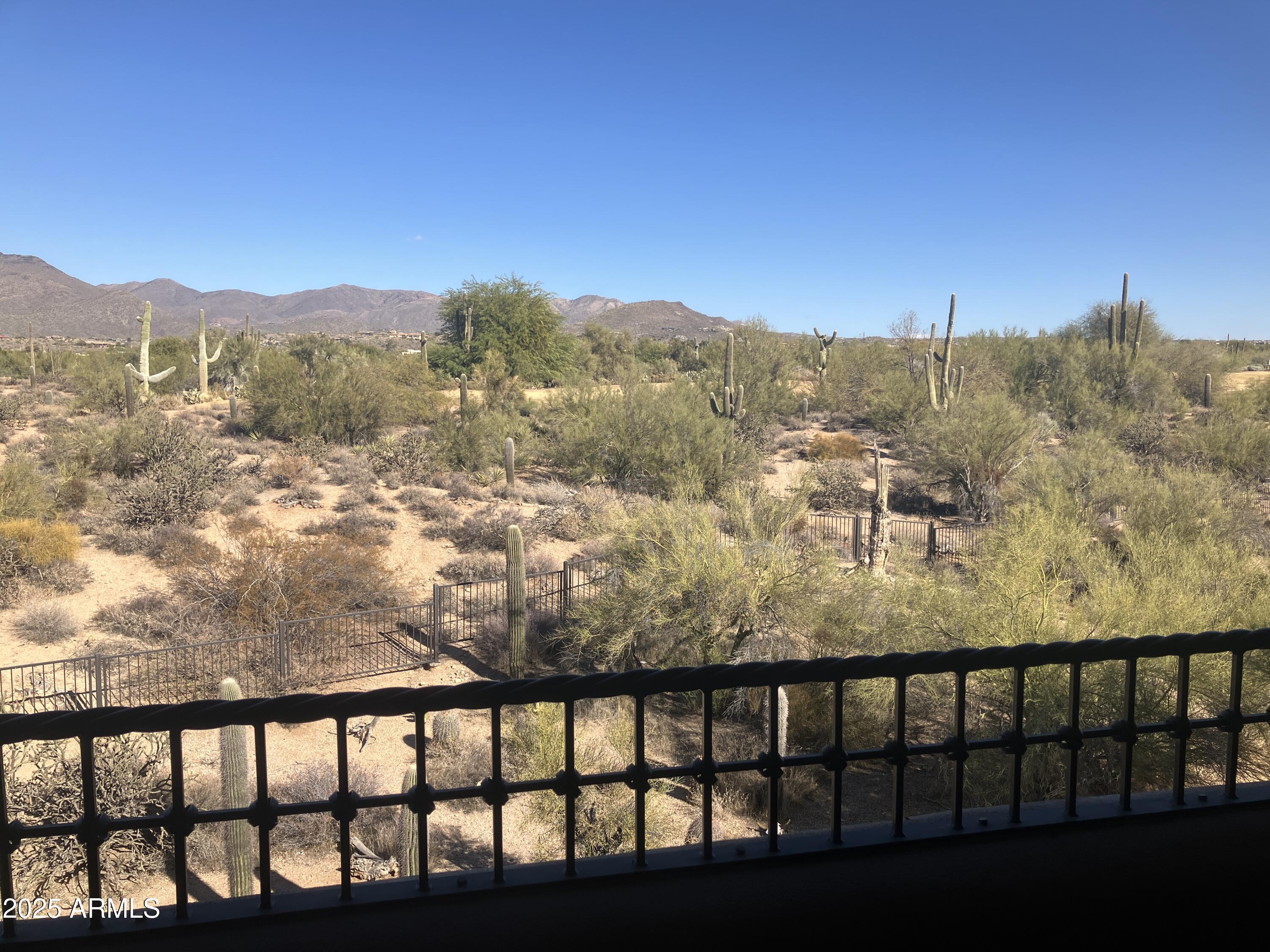 36601 North Mule Train Road, Unit 12C Carefree, AZ 85377 - Photo 18 of 42 a view of a city from a balcony