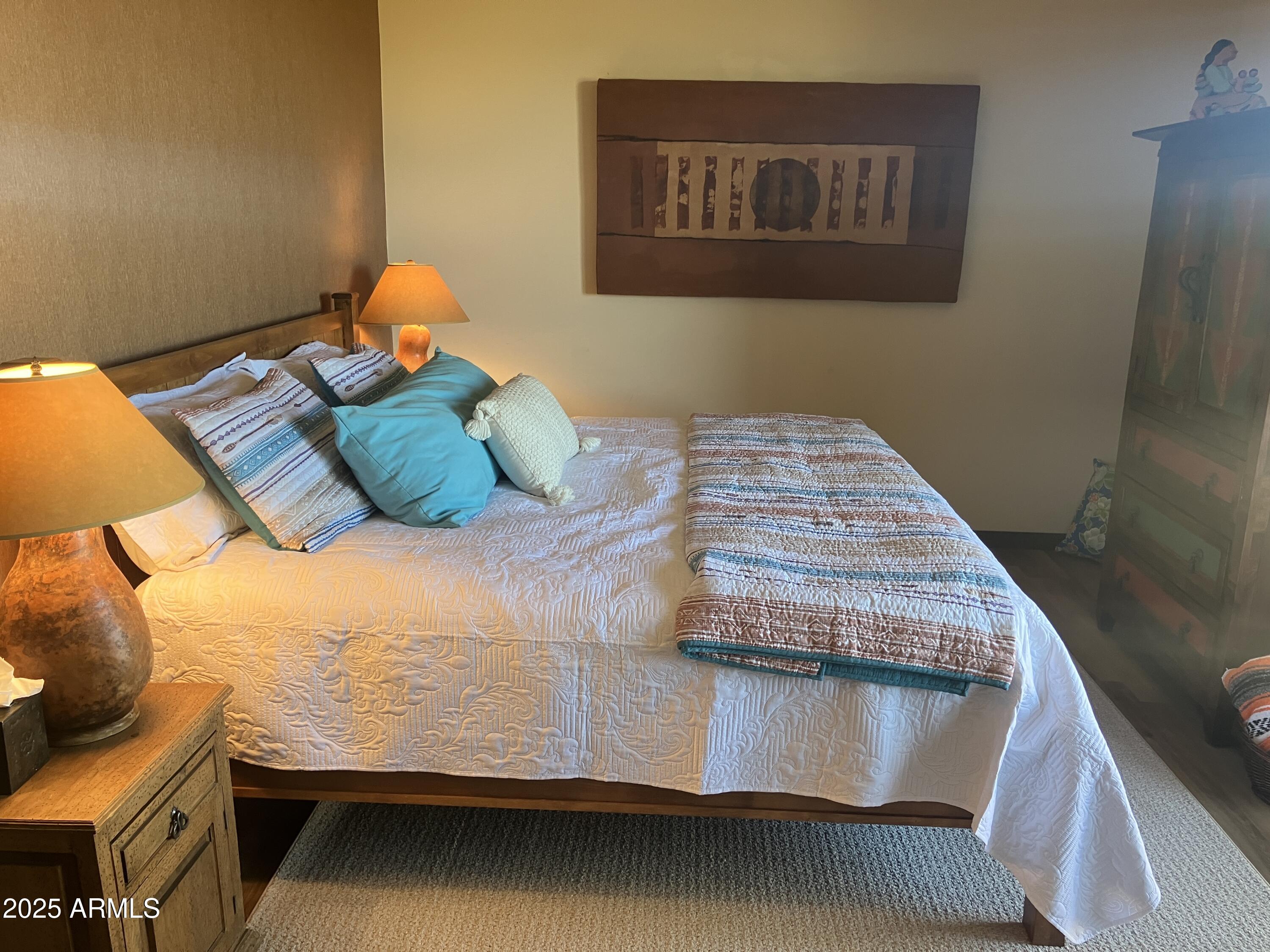 36601 North Mule Train Road, Unit 12C Carefree, AZ 85377 - Photo 26 of 42 a bedroom with a bed and teddy bear on bed
