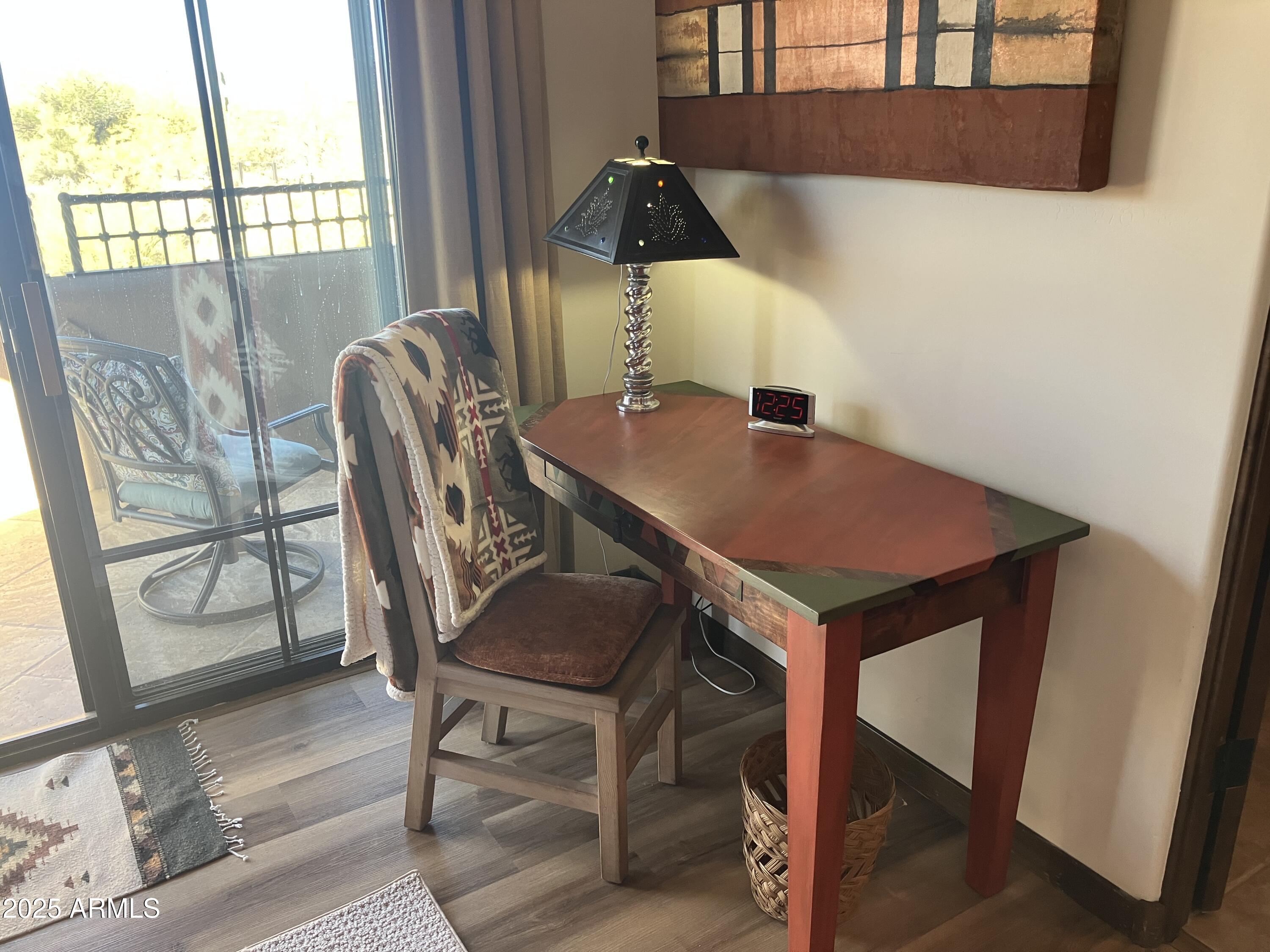 36601 North Mule Train Road, Unit 12C Carefree, AZ 85377 - Photo 27 of 42 a dining room with furniture and window