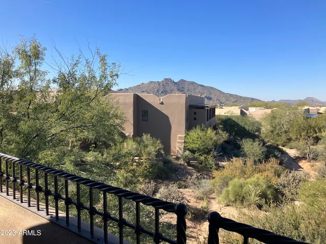 a view of mountains and valleys