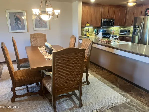 a view of a dining room with furniture