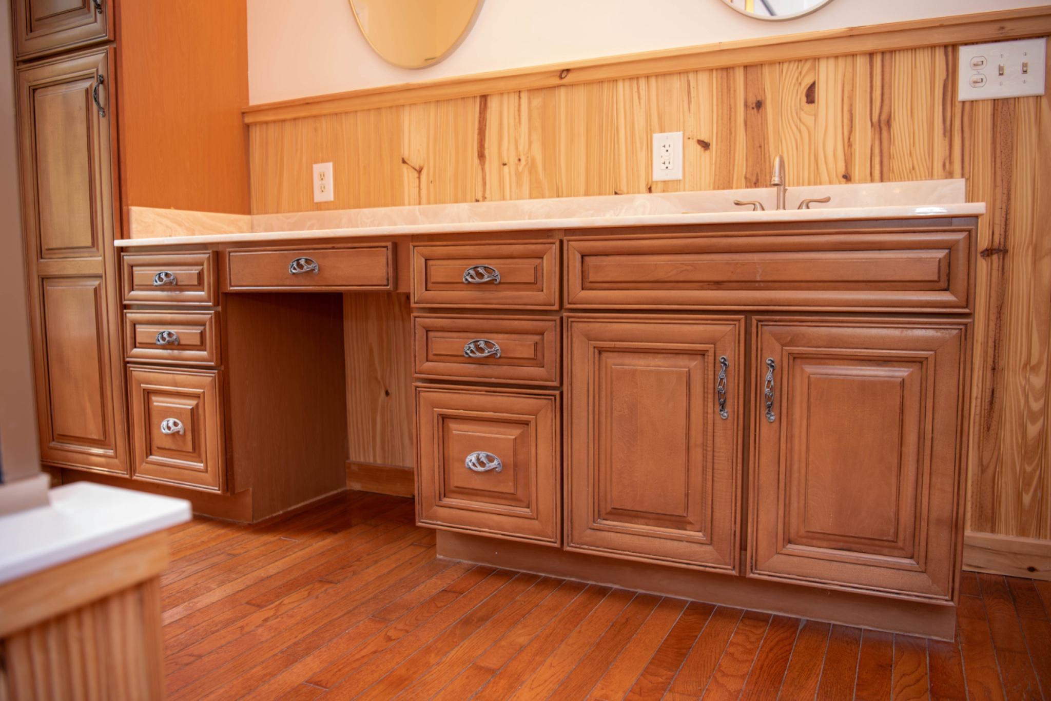 792 Forest Glen Road Moorefield, WV 26836 - Photo 67 of 146 Elegant wooden vanity in ensuite w/ample storage.