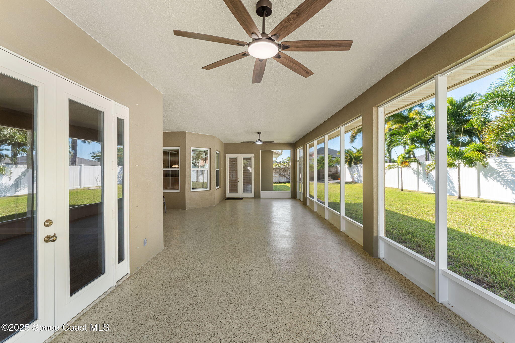 1239 Guy Island Drive Merritt Island, FL 32952 - Photo 29 of 42 a view of an entryway with a floor to ceiling windows