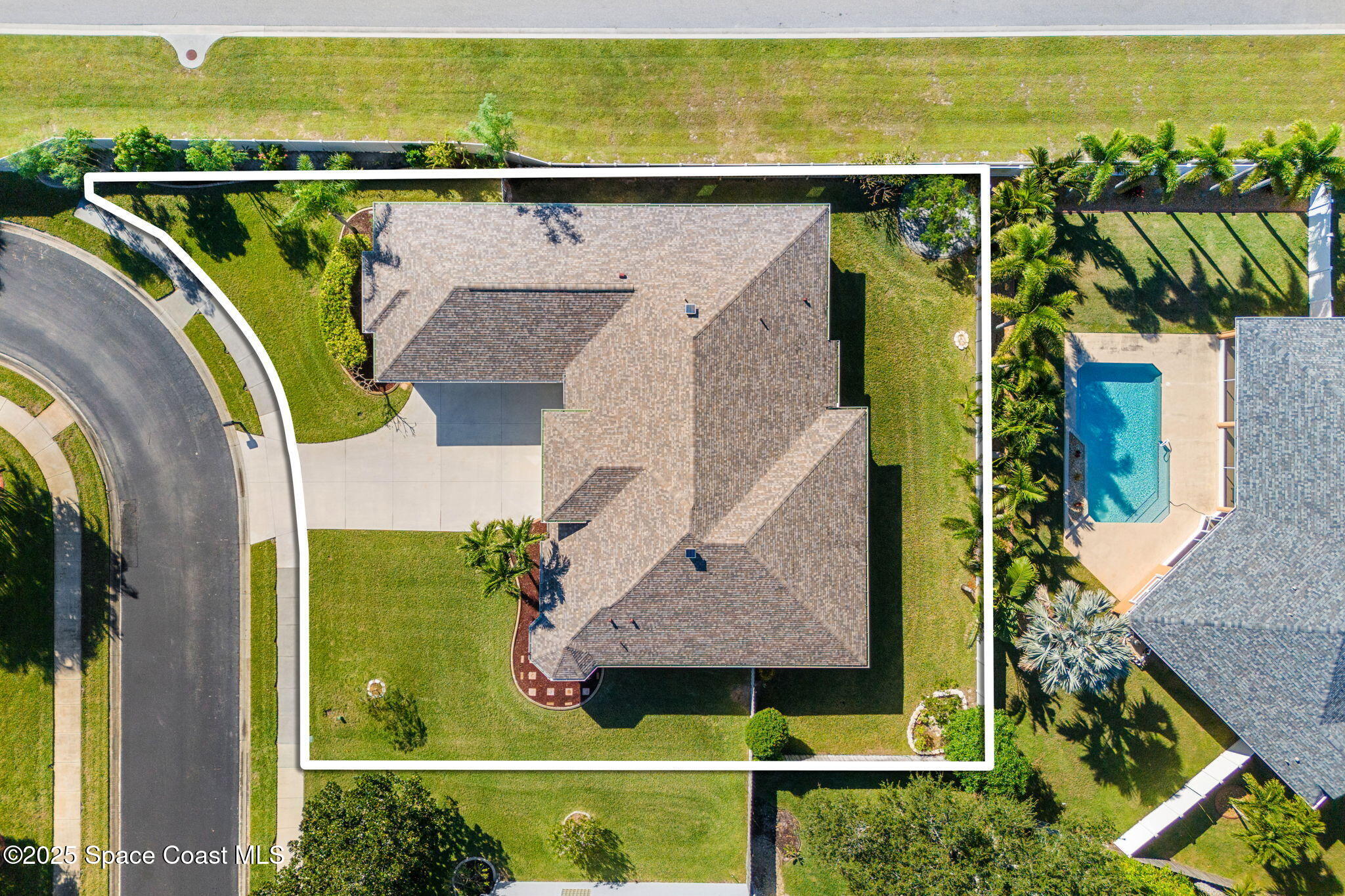 1239 Guy Island Drive Merritt Island, FL 32952 - Photo 35 of 42 an aerial view of a house with a garden and lake view