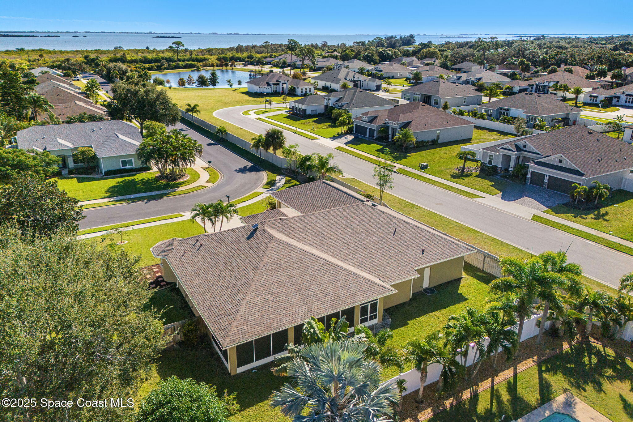 1239 Guy Island Drive Merritt Island, FL 32952 - Photo 36 of 42 an aerial view of a house with a swimming pool