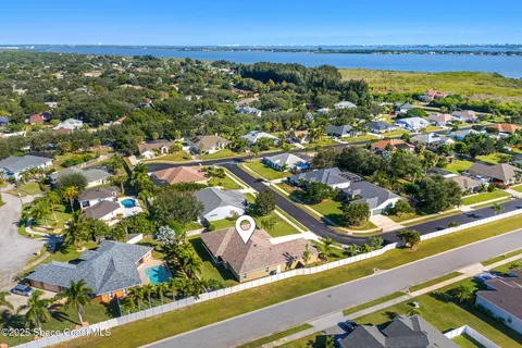 a view of a city with an ocean view
