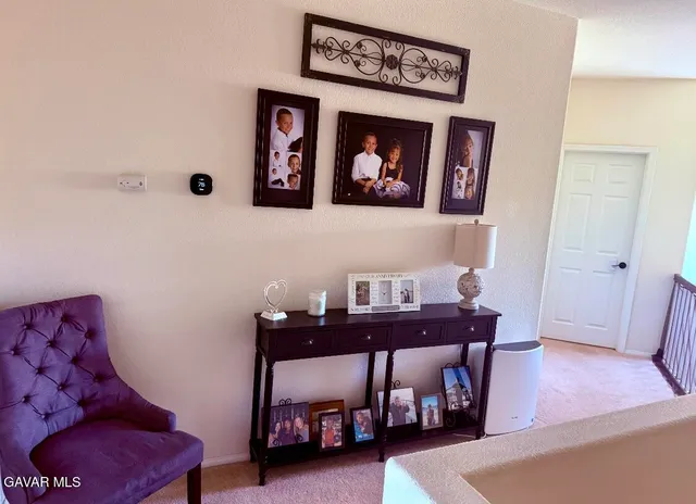 a view of a livingroom with furniture and a couch