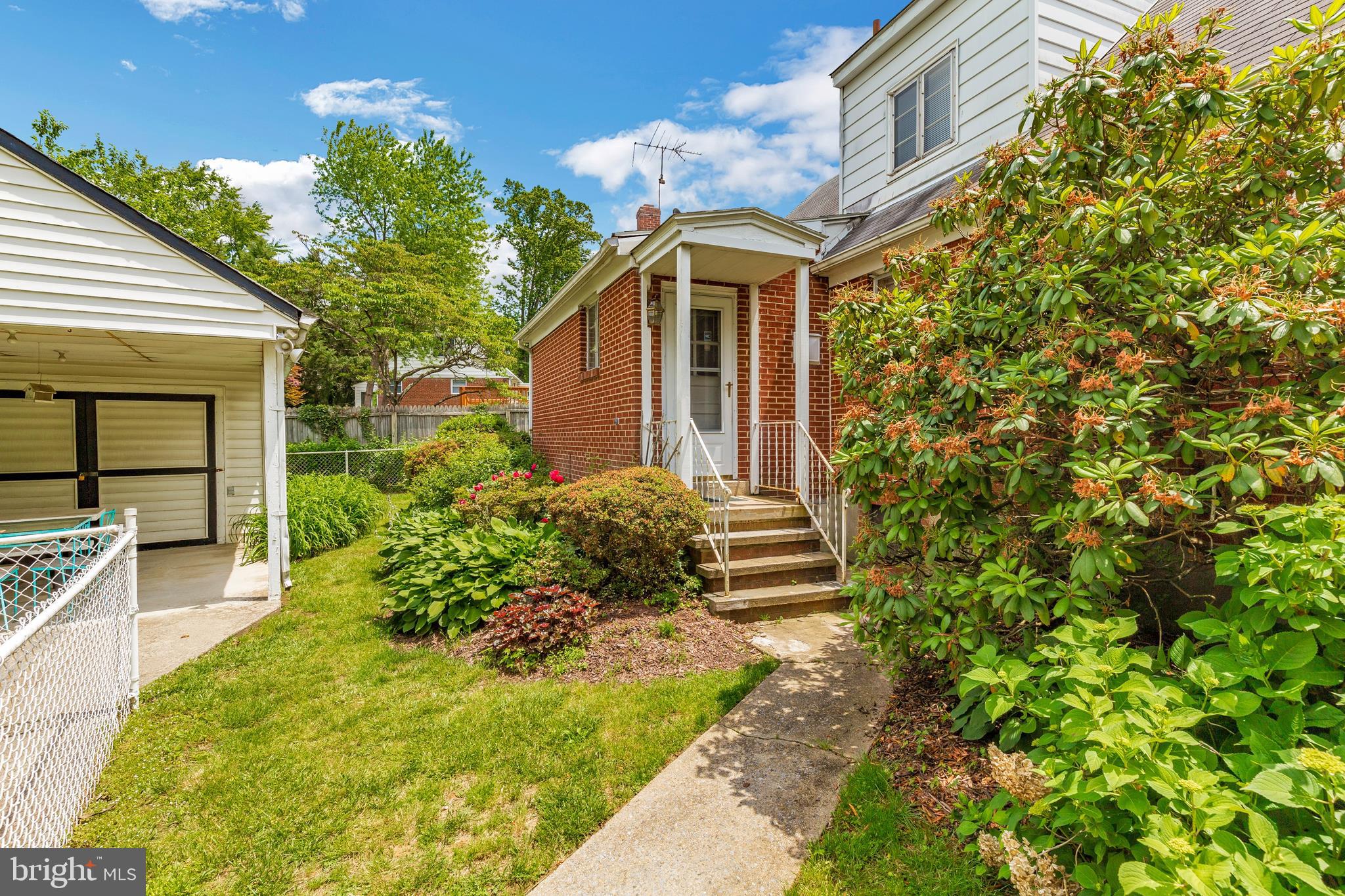 3929 Weller Road Silver Spring, MD 20906 - Photo 43 of 54 a front view of a house with a yard