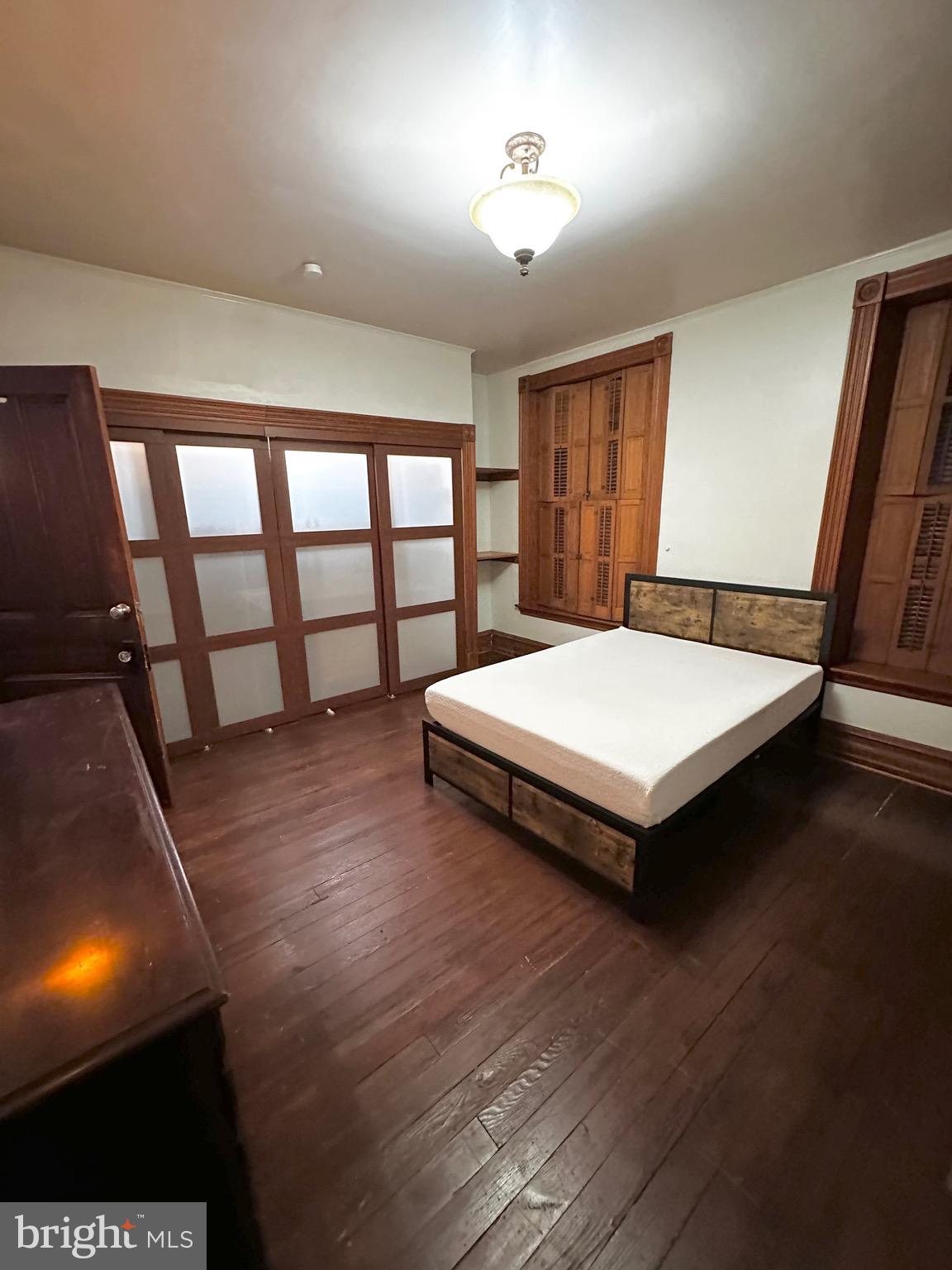 1396 Perkiomen Avenue Reading, PA 19602 - Photo 18 of 45 a bedroom with a bed and a large window