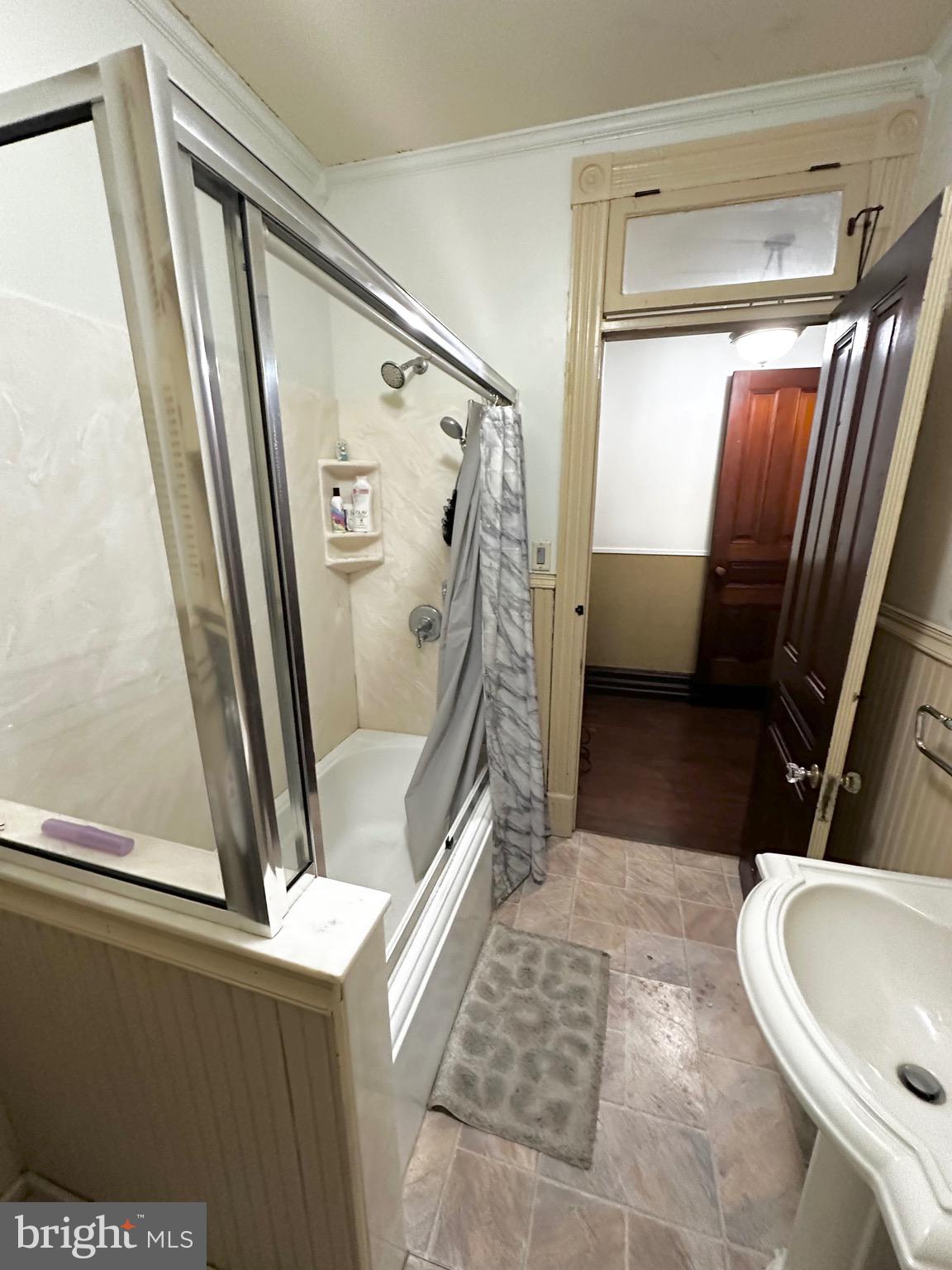 1396 Perkiomen Avenue Reading, PA 19602 - Photo 23 of 45 a bathroom with a sink and a mirror