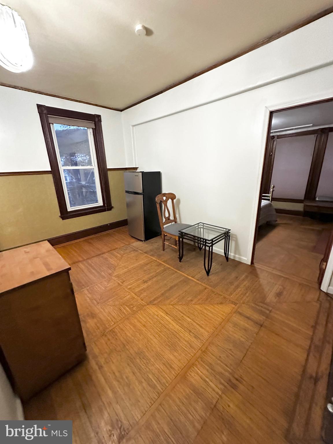 1396 Perkiomen Avenue Reading, PA 19602 - Photo 28 of 45 a room with furniture and air conditioner vent