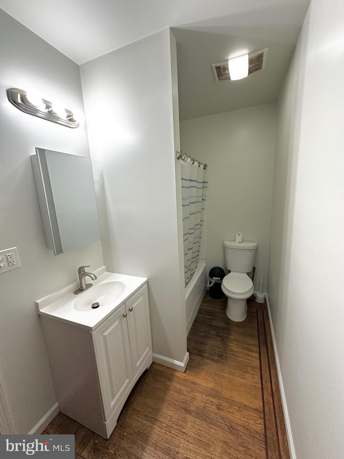 1396 Perkiomen Avenue Reading, PA 19602 - Photo 29 of 45 a bathroom with a sink and a mirror