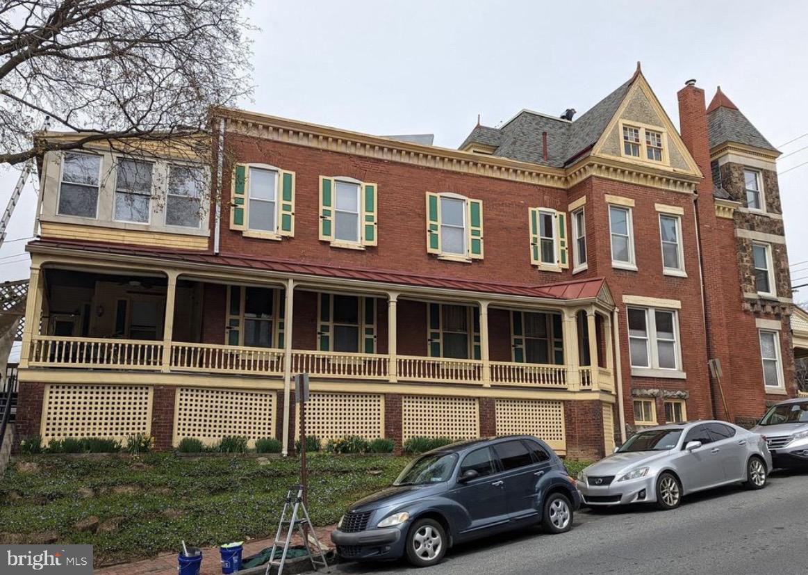 1396 Perkiomen Avenue Reading, PA 19602 - Photo 5 of 45 a front view of a house with a garden