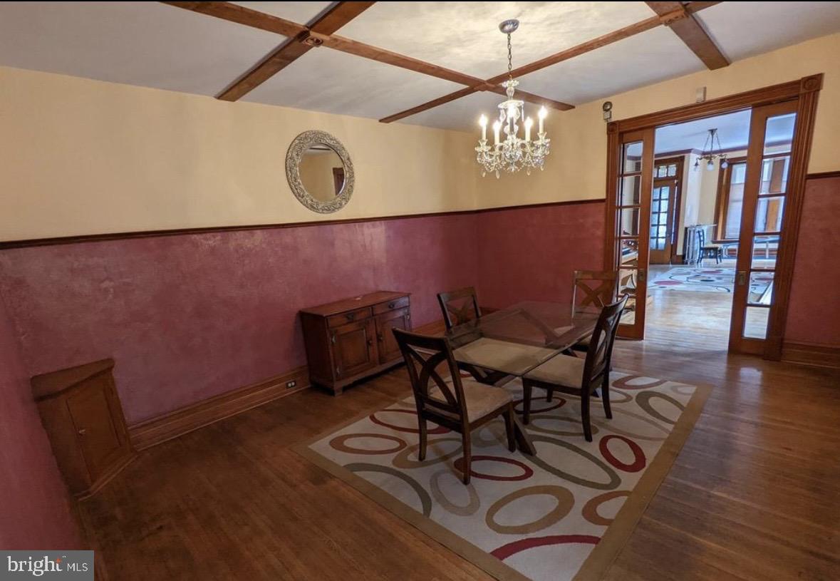 1396 Perkiomen Avenue Reading, PA 19602 - Photo 9 of 45 a view of a dining room with furniture and wooden floor