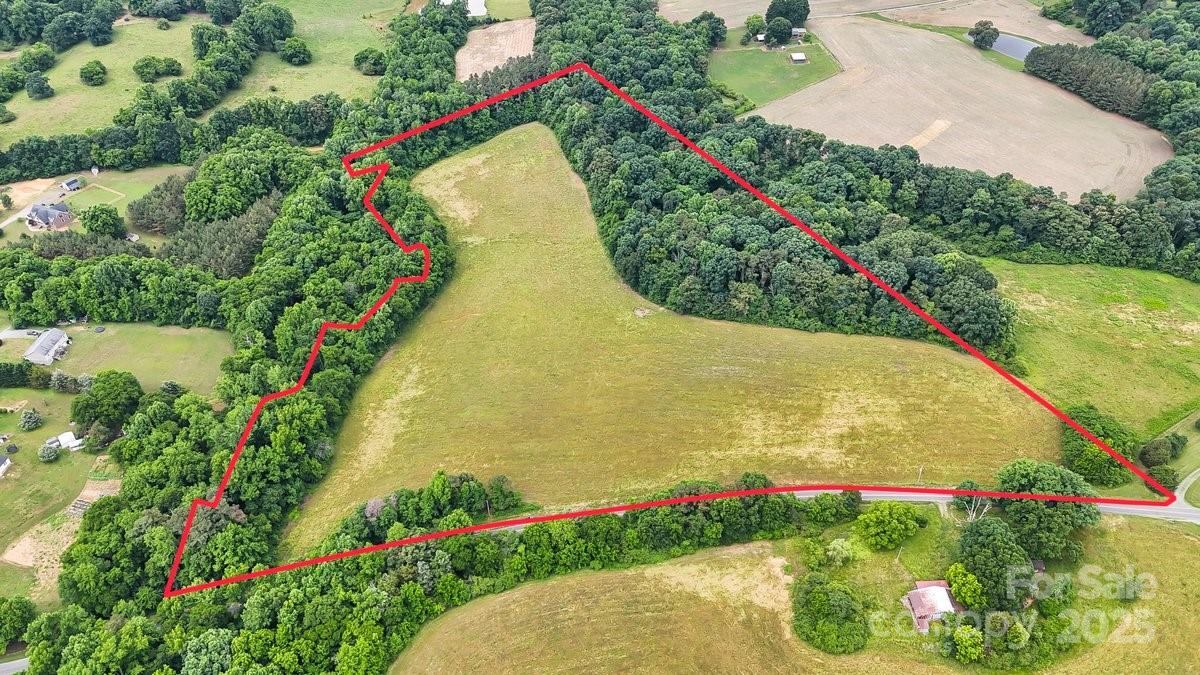 0 Pennington Road Albemarle, NC 28001 - Photo 3 of 10 a view of a garden with flowers